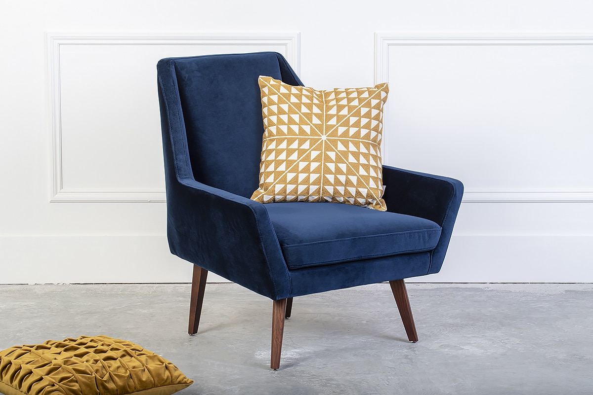 navy velvet upholstery armchair with wooden legs