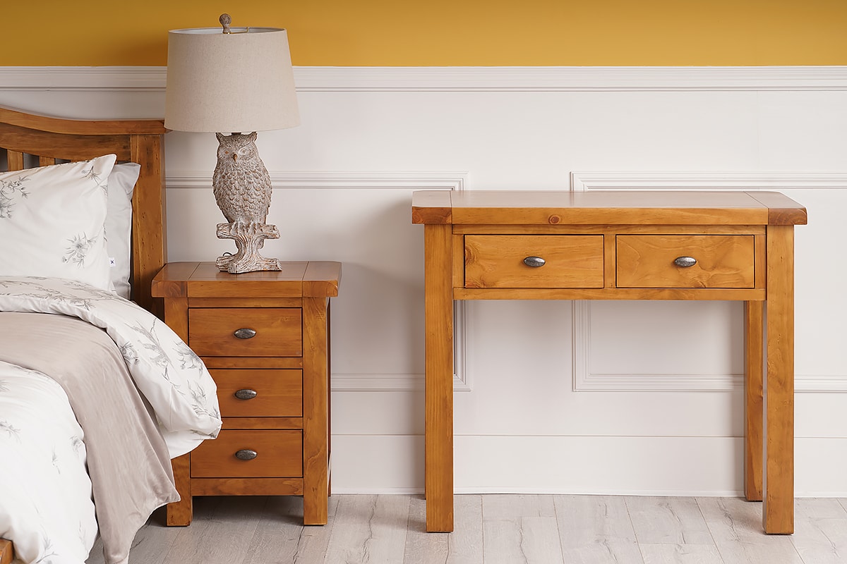 Neat dressing table, its sturdy build and shape appearing traditional and homely