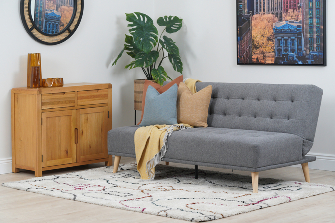 Studio Grey Fabric 3 Seater Sofa Bed in Living Room Setting